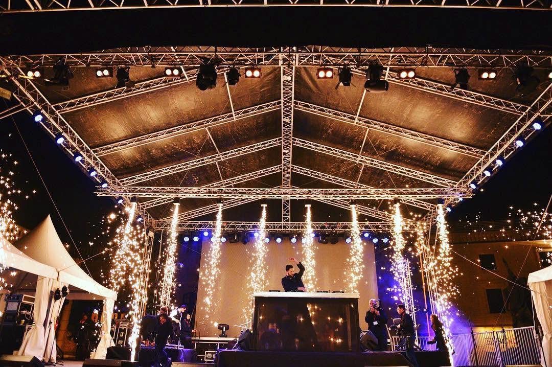 Cold sparkler fountains firing across the front of the stage