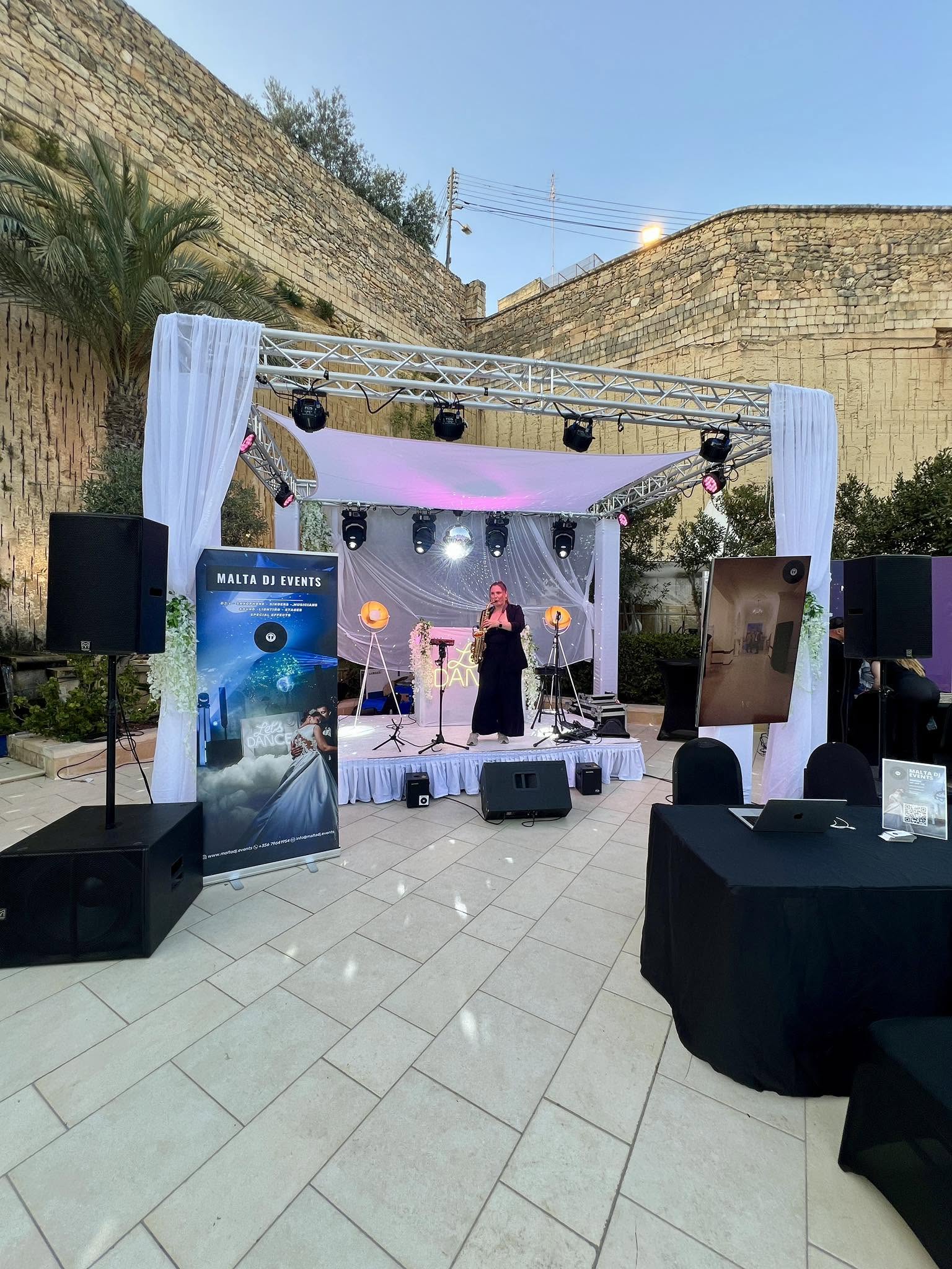 Draped truss stage