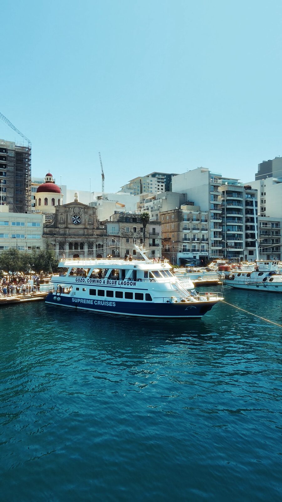 Boat moored at Spinola Bay before the charter