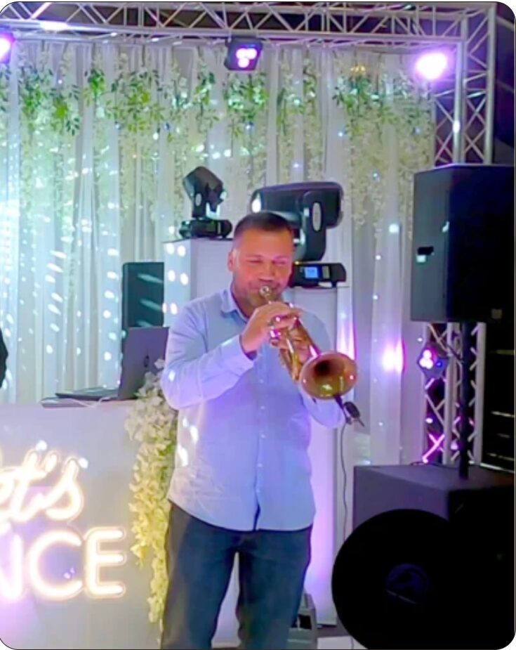 Live musician performing with the DJ