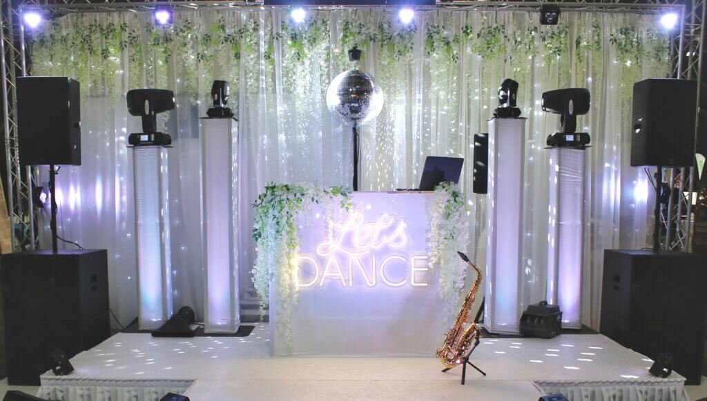Diamond Package - 5 hrs - International DJ NEO-X, 2 hrs - International Saxophonist Justine, 2 hrs - MDE Pro Percussionist, Professional Martin Audio Sound System - x4 Subwoofers, x2 Speakers, DJ monitor speaker, Wireless Microphone (for speeches/announcements), Lighting (programmed with artificial intelligence) - x16 Battery operated uplighters, x4 Moving heads on trusses, x2 Vintage Lamps, Let’s Dance Sign, Disco Ball on stand with Spotlights, Staging - Stage Platform (4m x 3m), DJ Stand (with white cover option), Special Effects -  x4 Cold Sparklers, Pioneer DJ equipment, Backup equipment